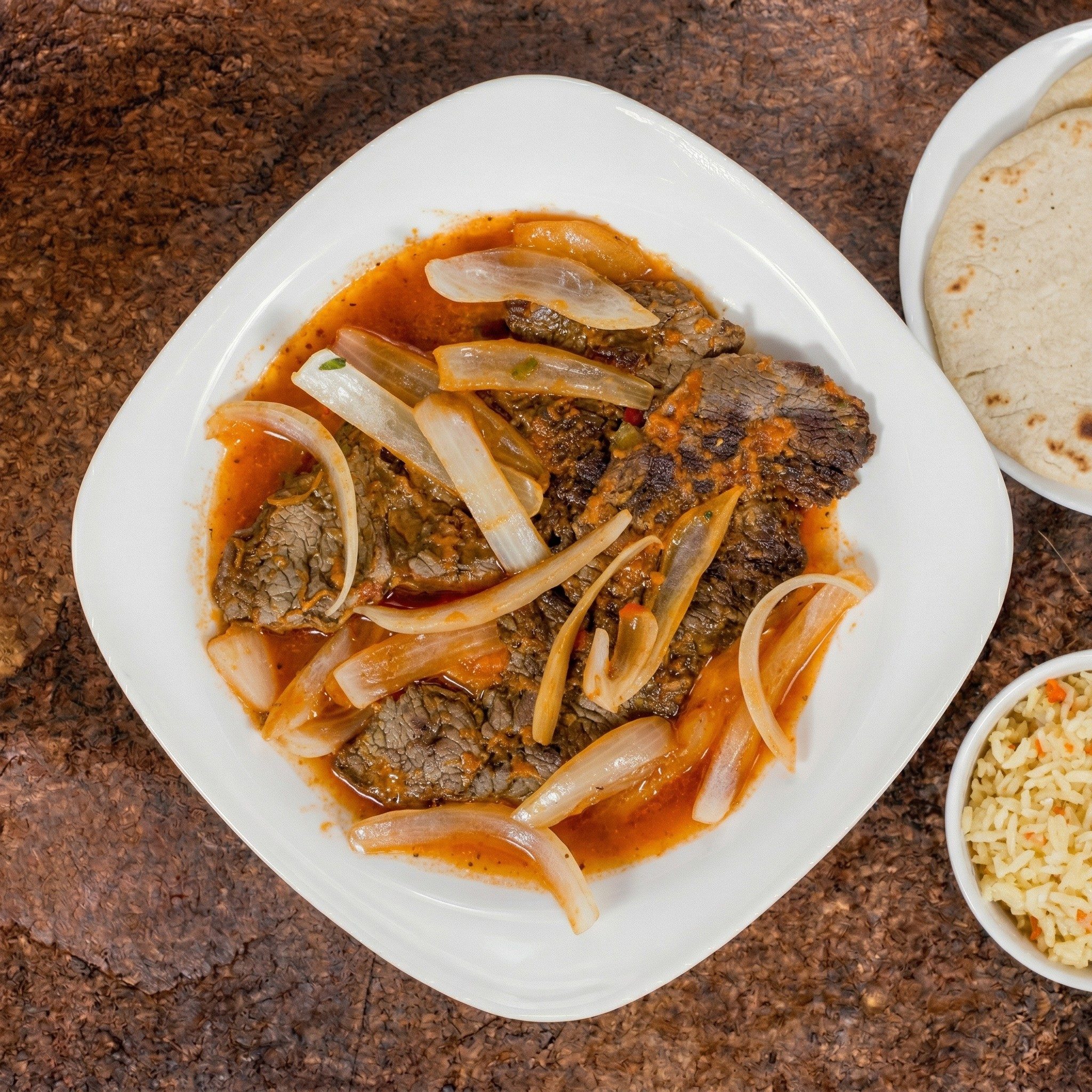 Bistec Encebollado.